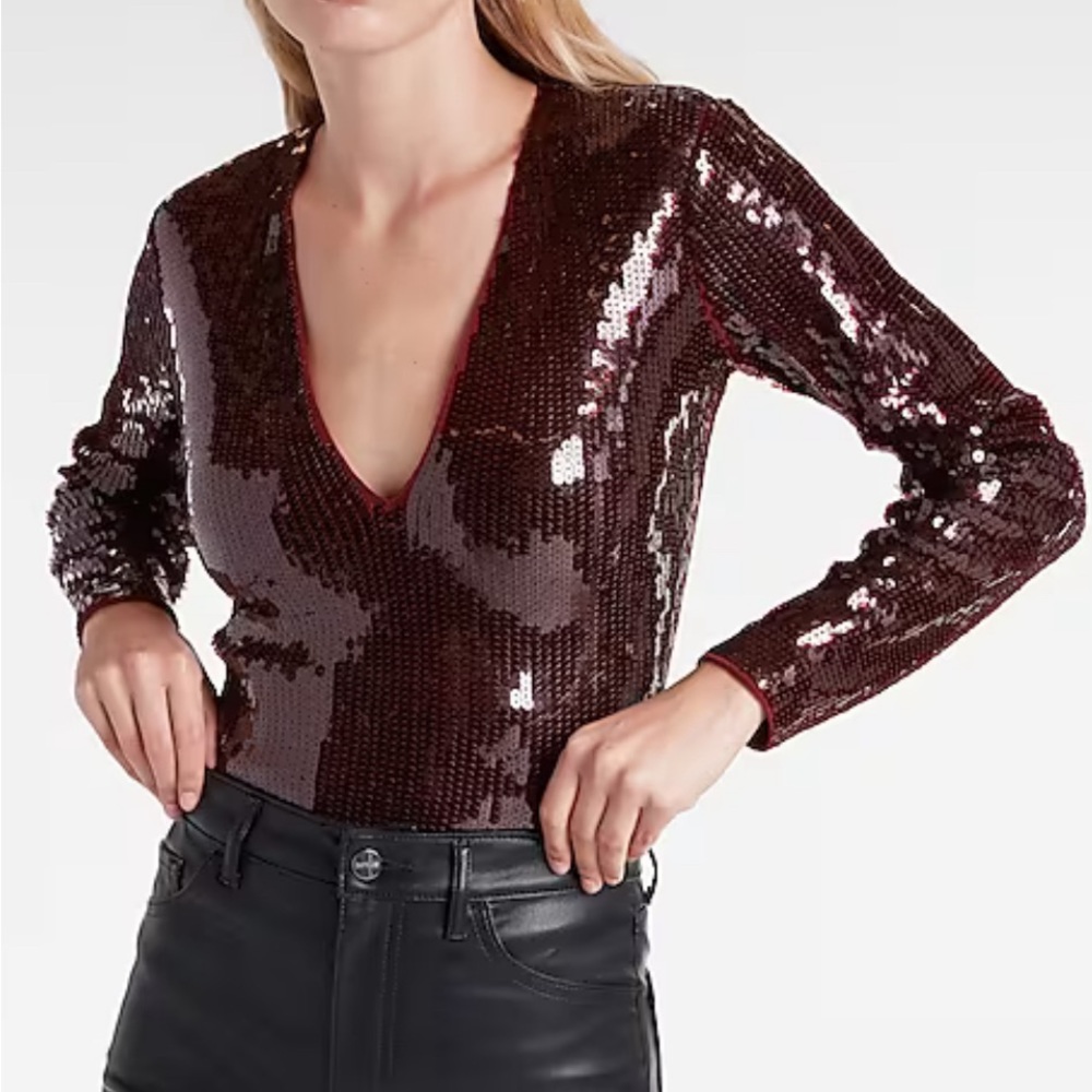 Like New Express Deep V-neck long sleeve thong bodysuit. Fits Xsmall- Small.
